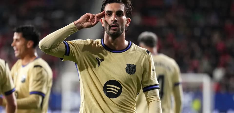 Player celebrating with a salute after scoring