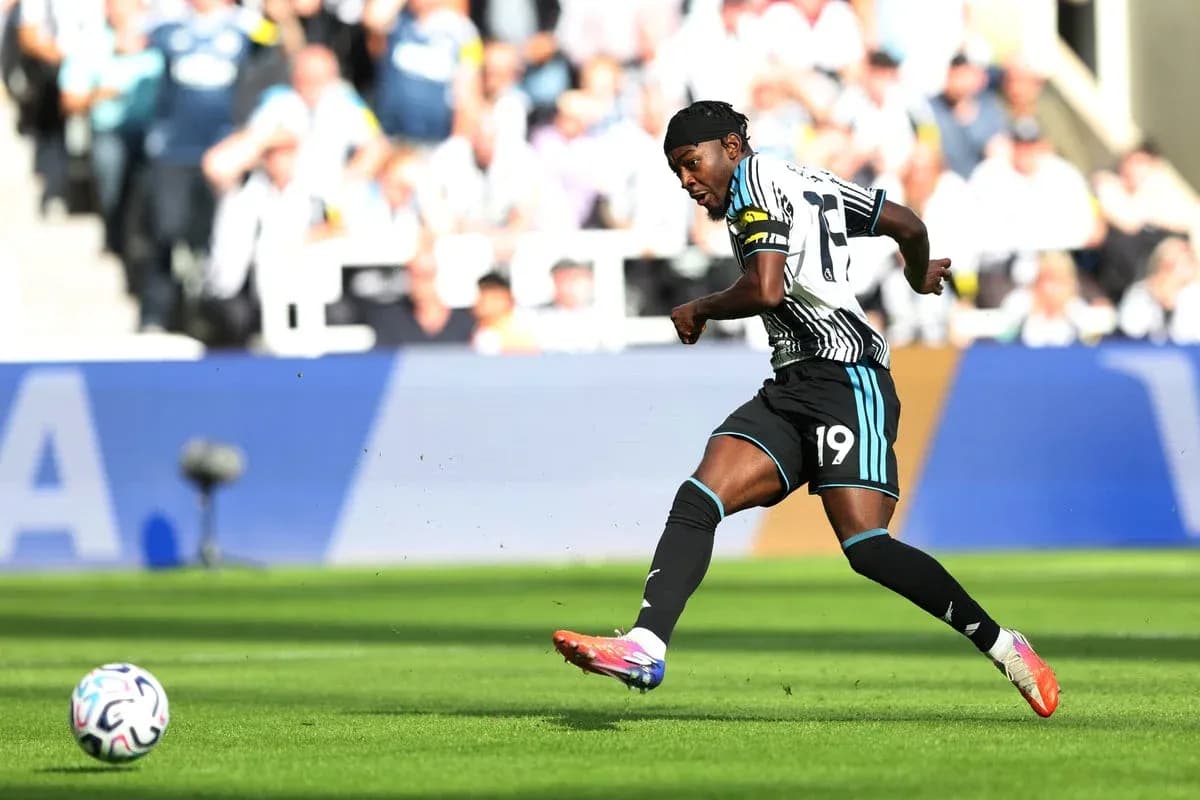 Newcastle player striking ball during match