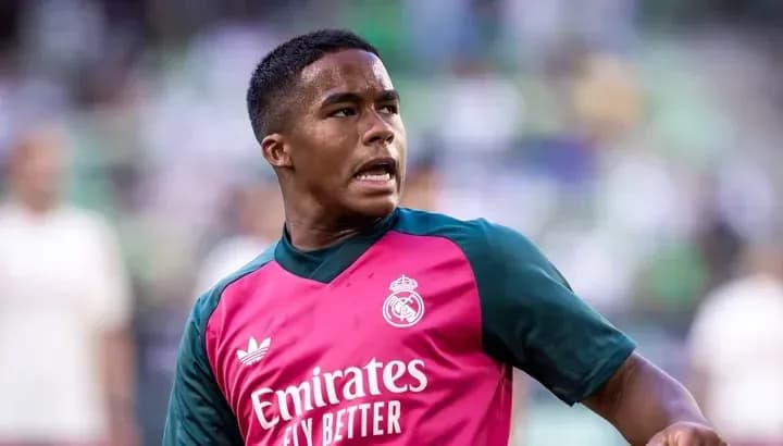 Player in Real Madrid training kit during warm-up