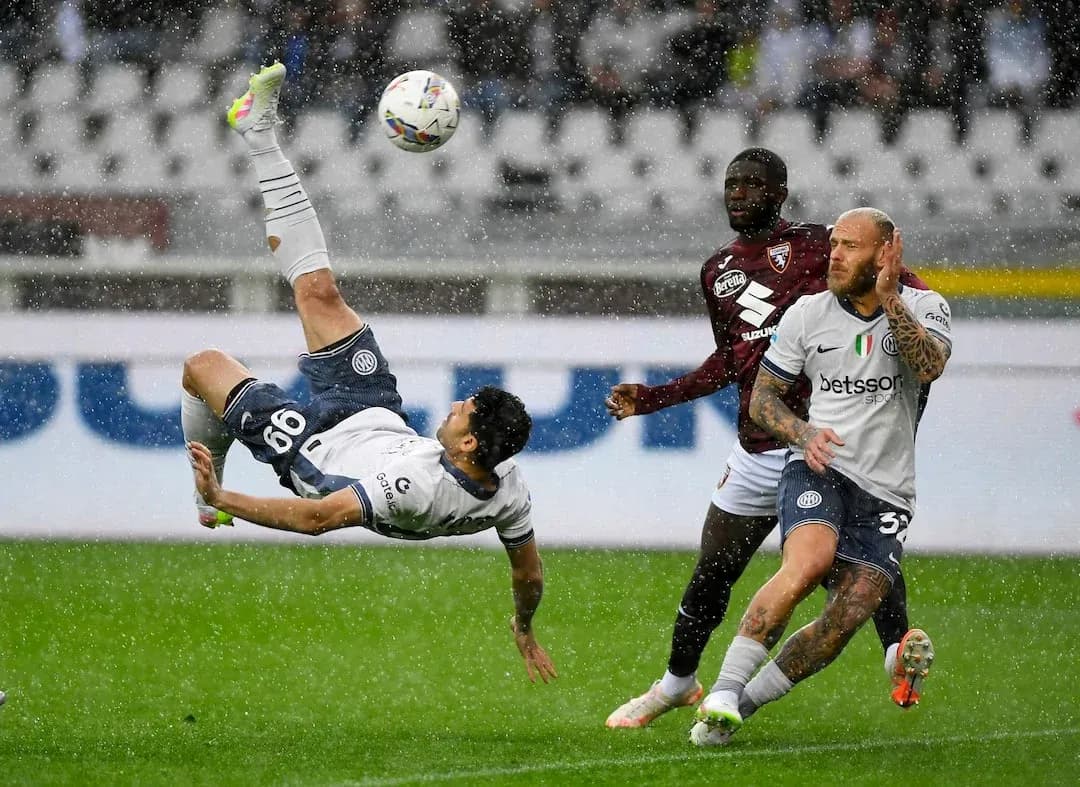 Player performing a bicycle kick during match
