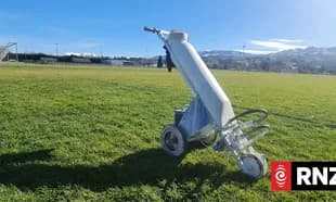 Line marking machine on a soccer field