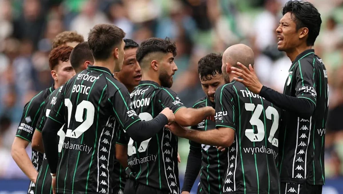 Players celebrating together after scoring a goal