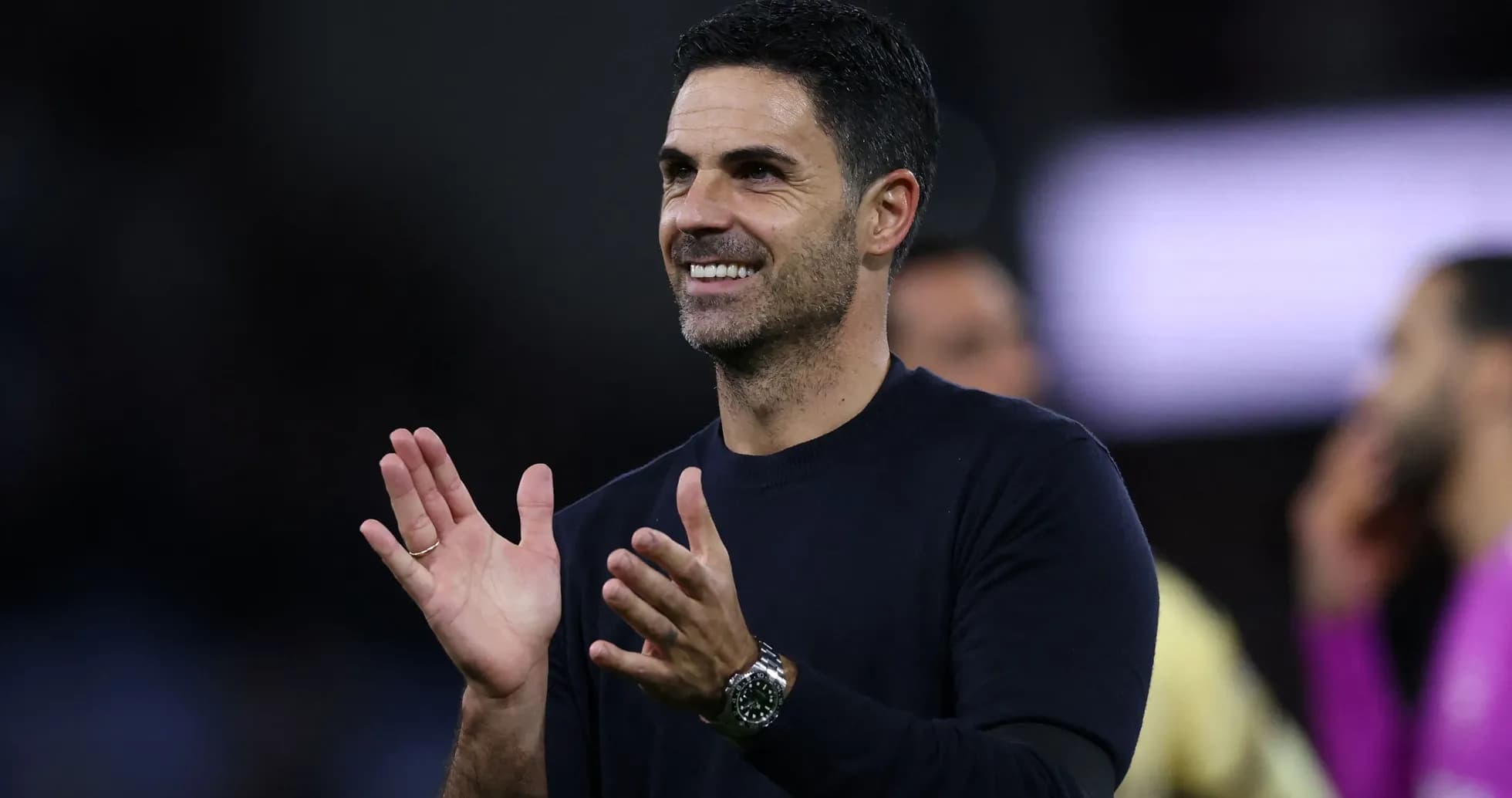 Coach applauding during match celebration