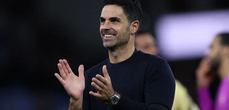 Coach applauding during match celebration