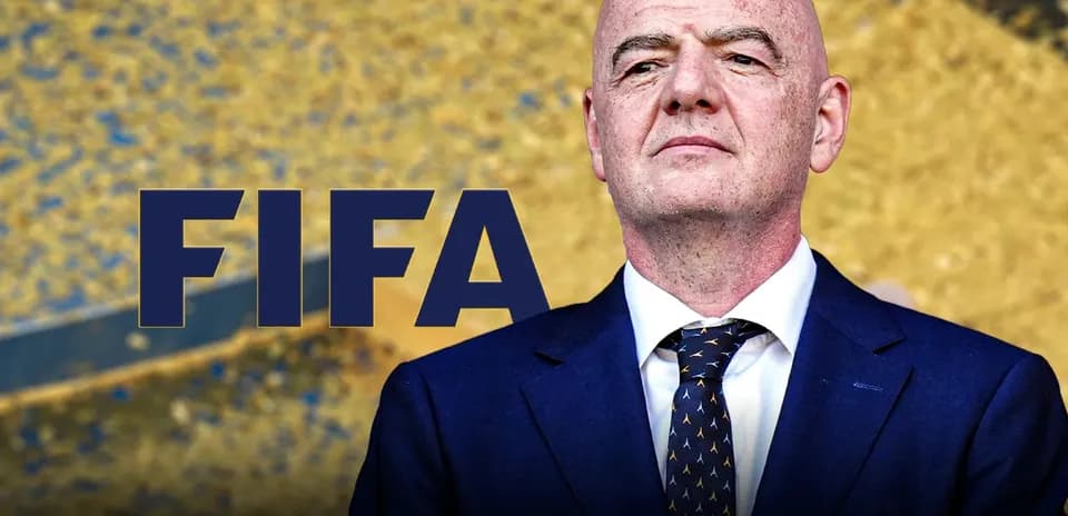 FIFA logo with official at press conference