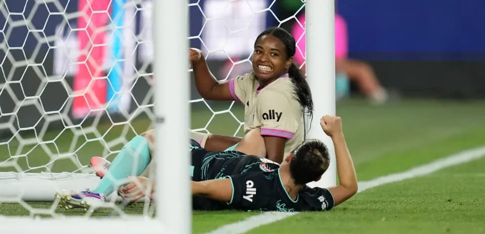 Player celebrating a goal during NWSL match