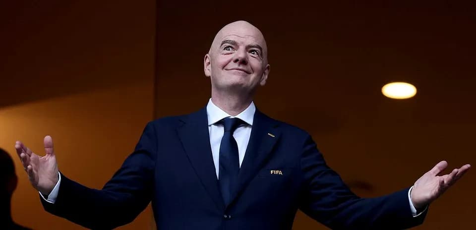 FIFA president gesturing during event presentation