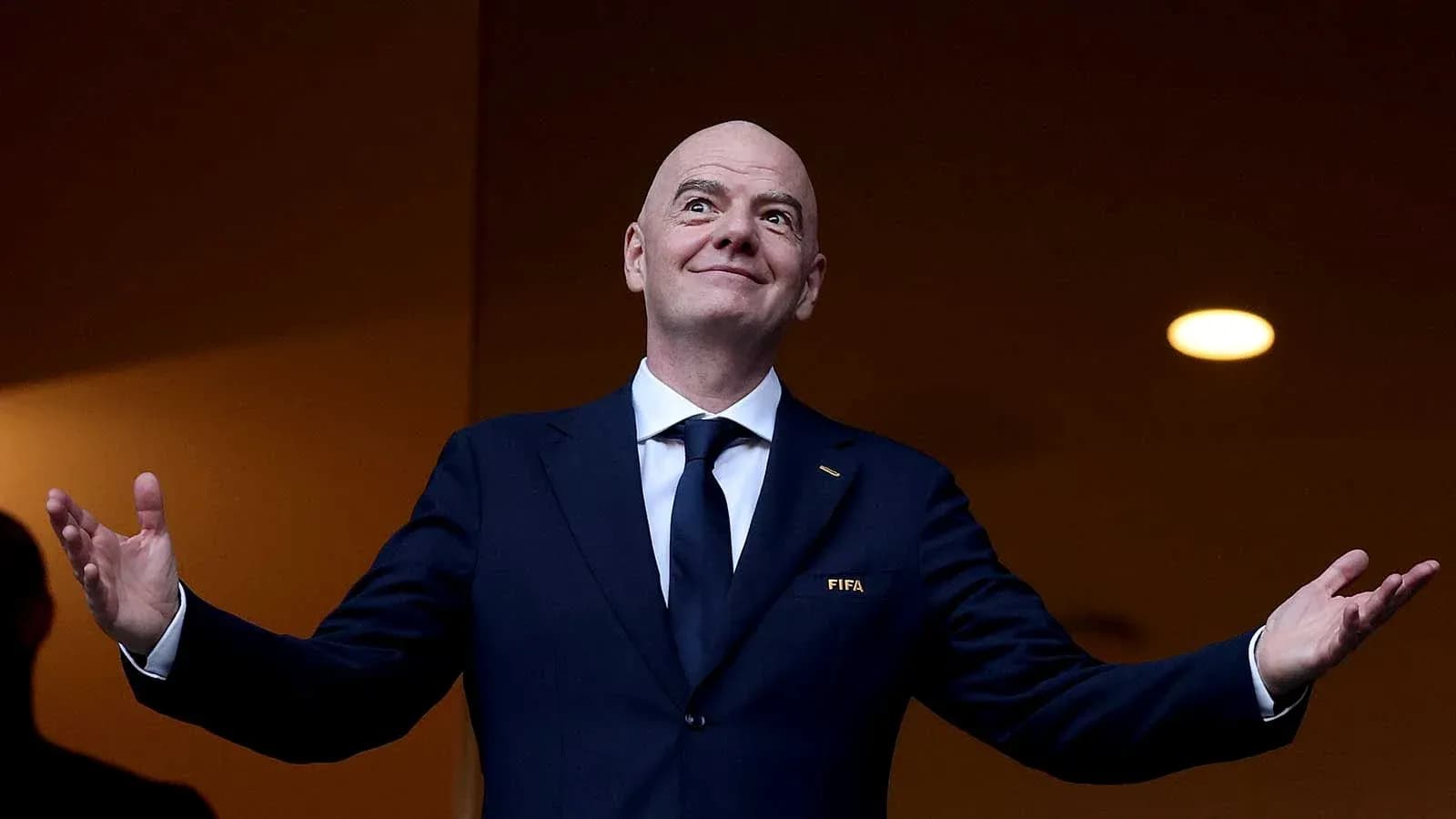 FIFA president gesturing during event presentation