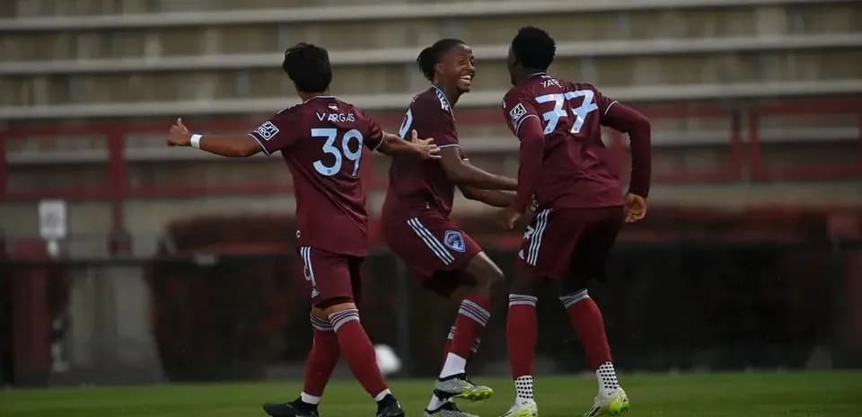 Colorado Rapids II players celebrating a goal