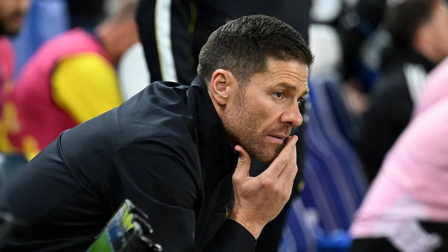 Coach observing the match from the sidelines