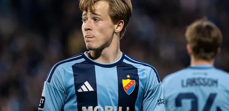 Player in blue jersey during match on field
