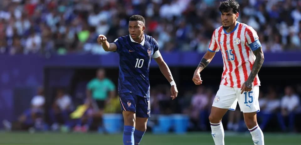Mbappe directing play during Paraguay vs France match
