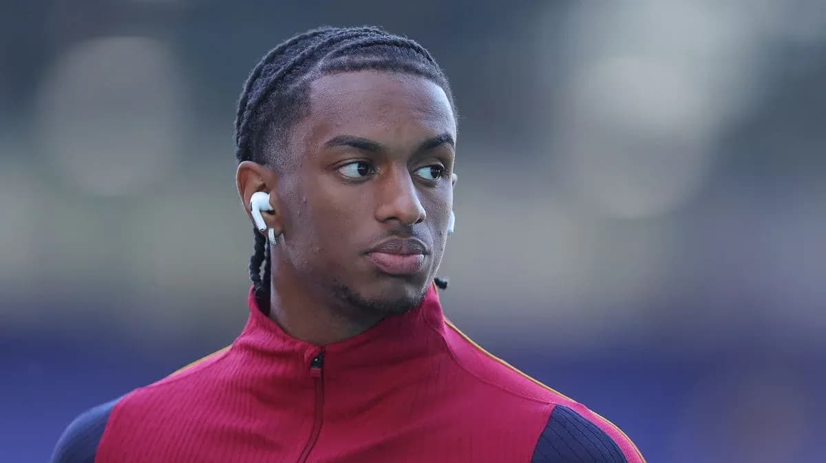 Player wearing earbuds before a match