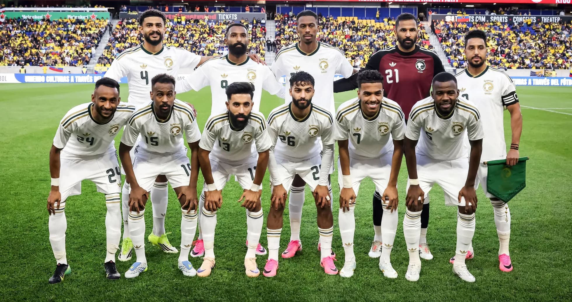 Soccer team posing for photo before match