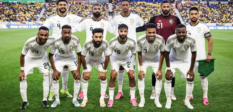 Soccer team posing for photo before match