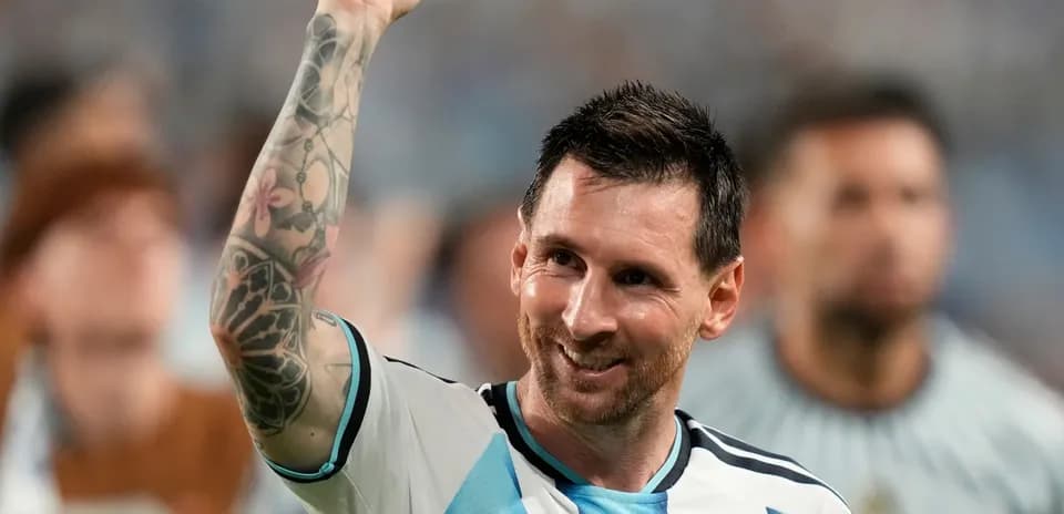 Lionel Messi celebrating with raised fist after match