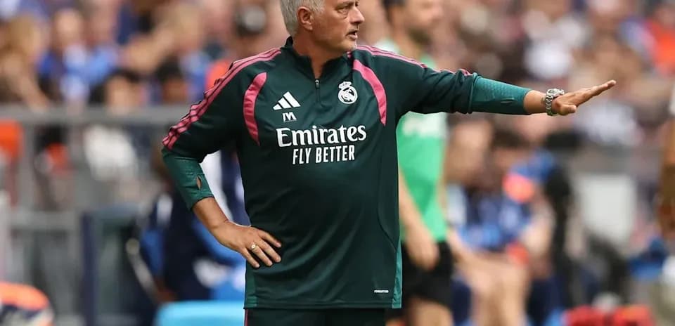 Coach directing players during a match