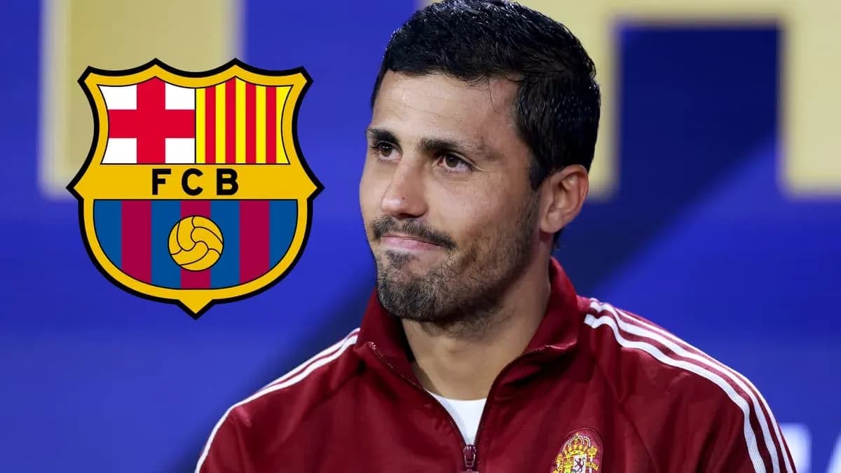 Man in red jacket with FC Barcelona logo