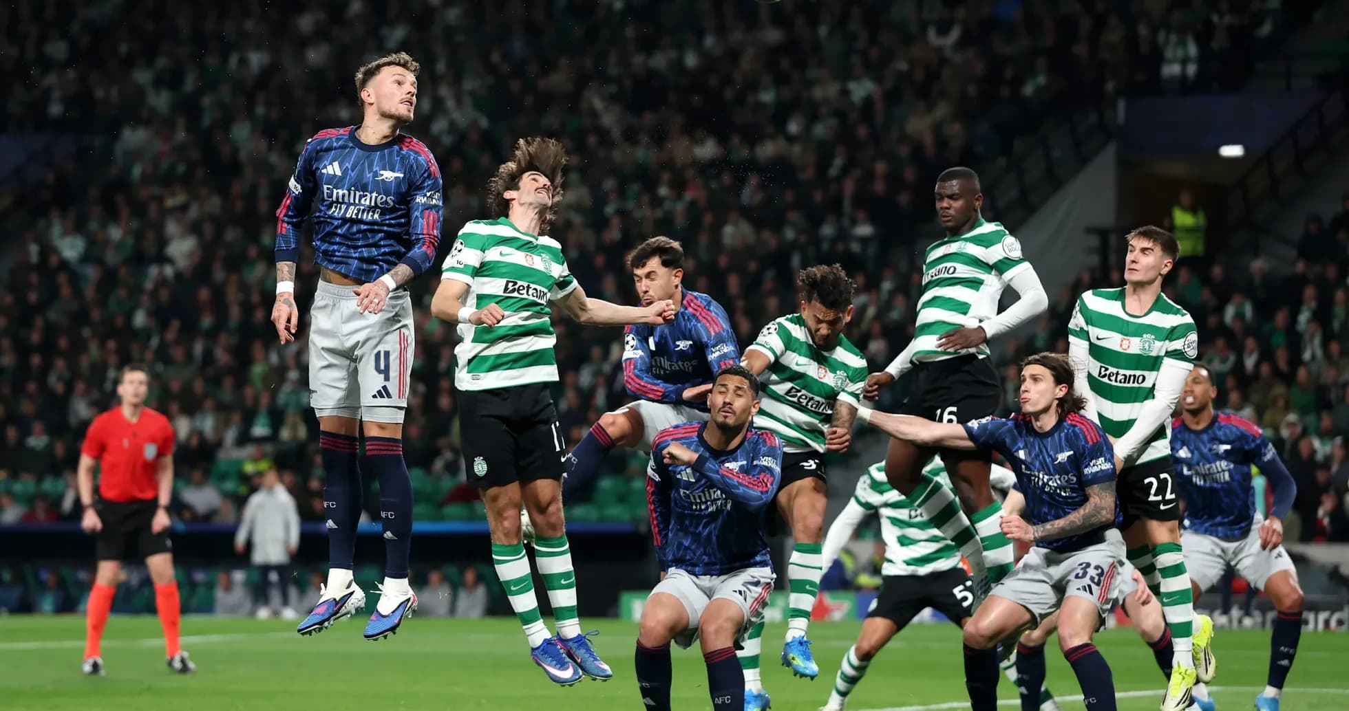 Players contesting a header during match action