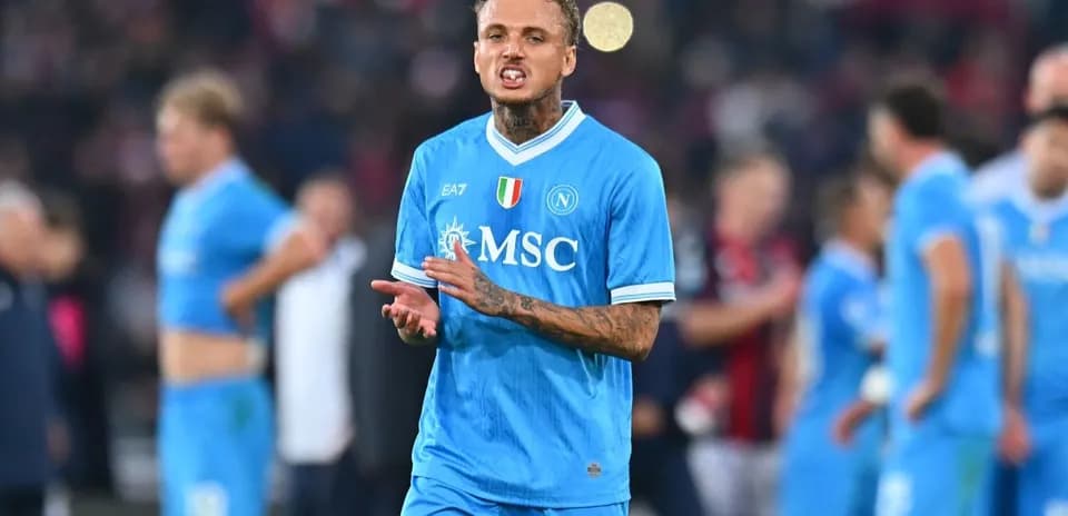 Player gesturing during match with teammates in background