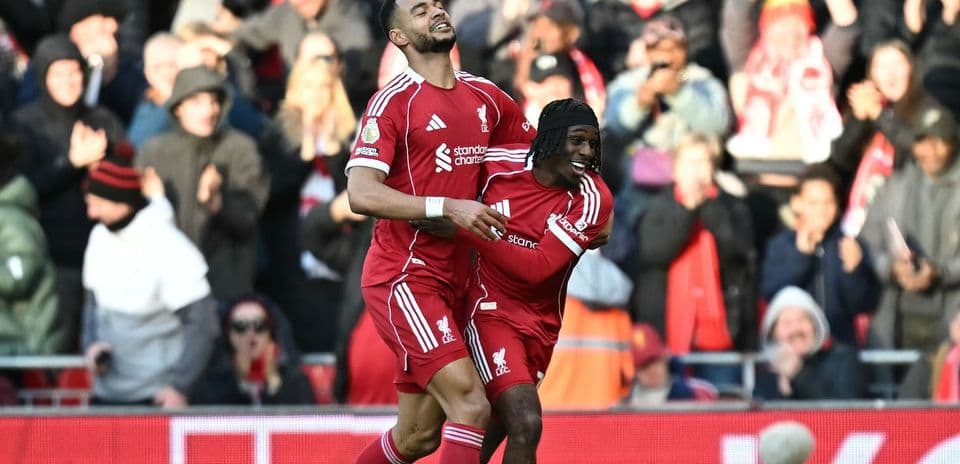 Liverpool players celebrating a goal during match