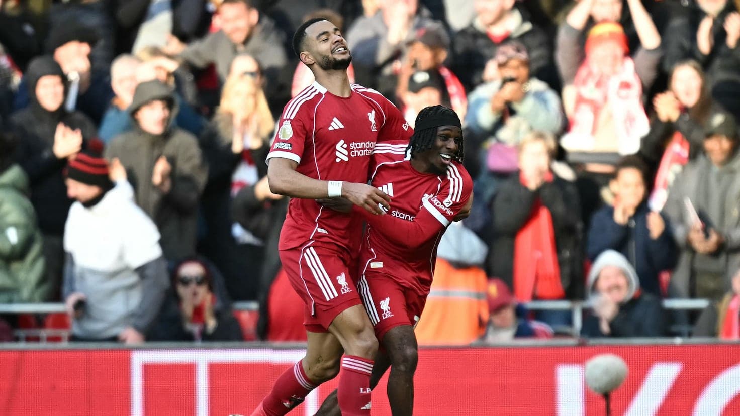 Liverpool players celebrating a goal during match