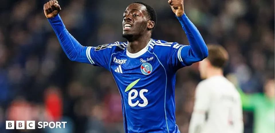 Player celebrating in blue jersey during match