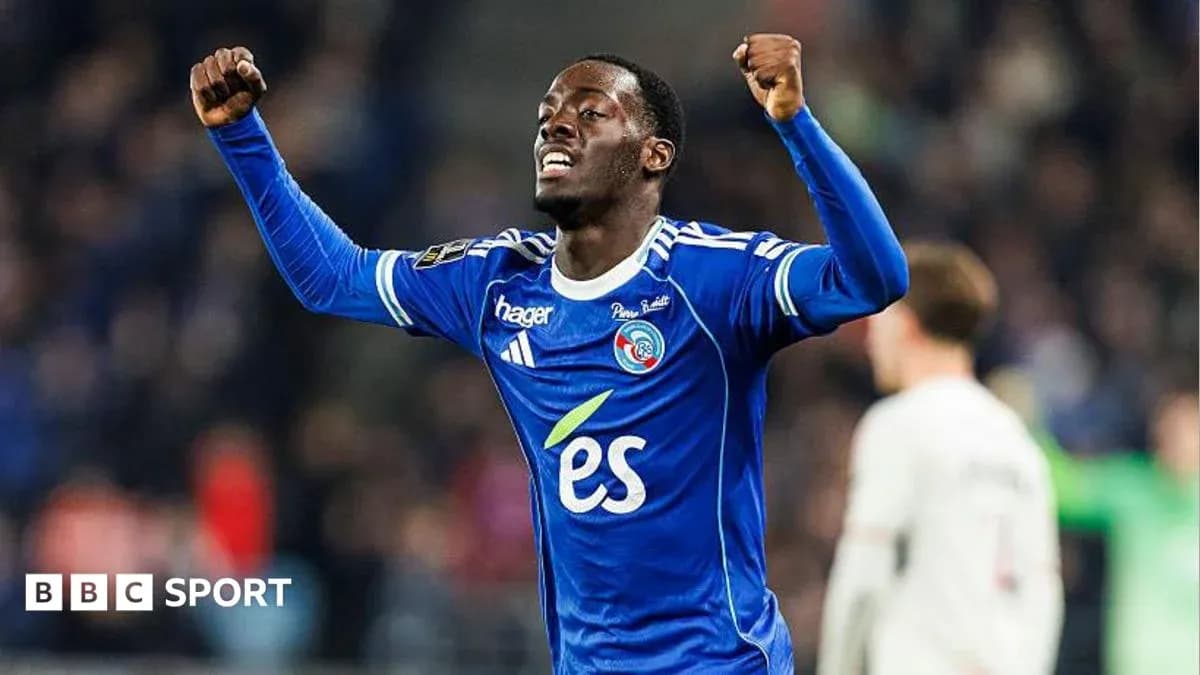 Player celebrating in blue jersey during match