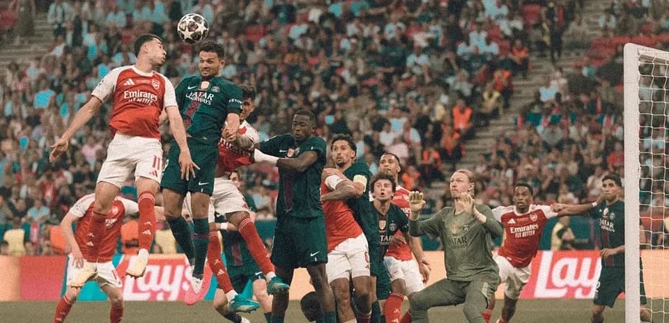 Players contesting for a header during a corner kick