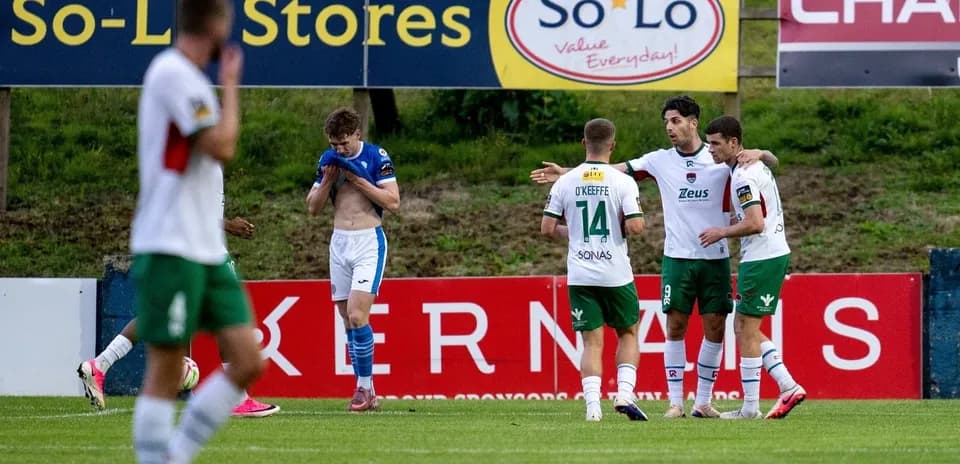 Players celebrating a goal during football match