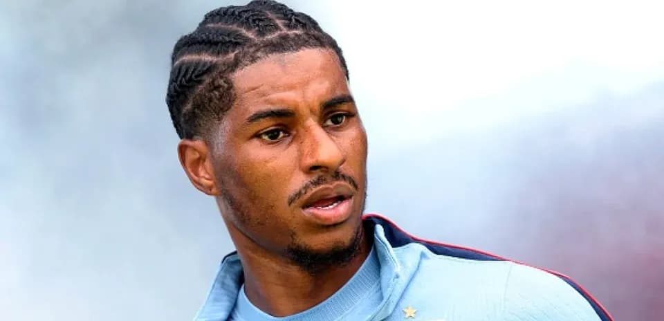 Player in training gear looking off-camera