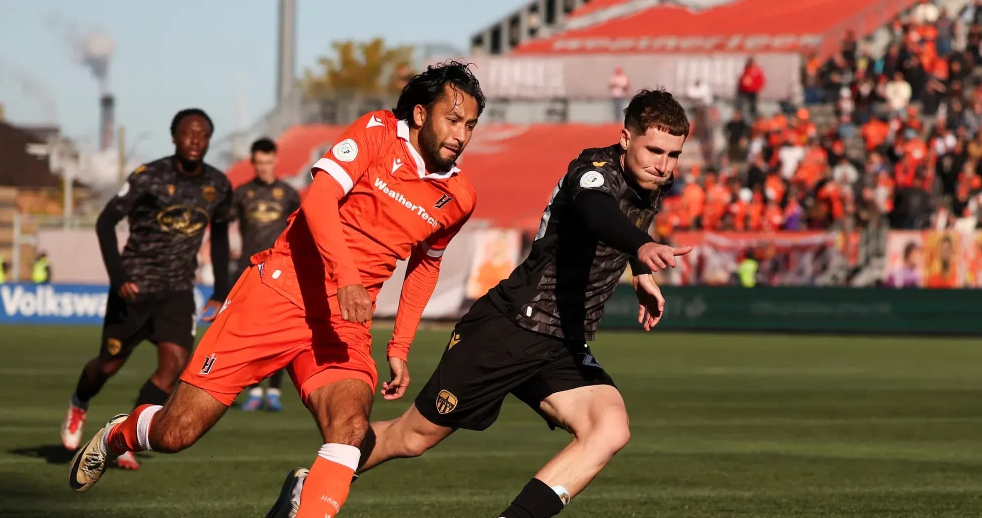 Player competing for the ball during match