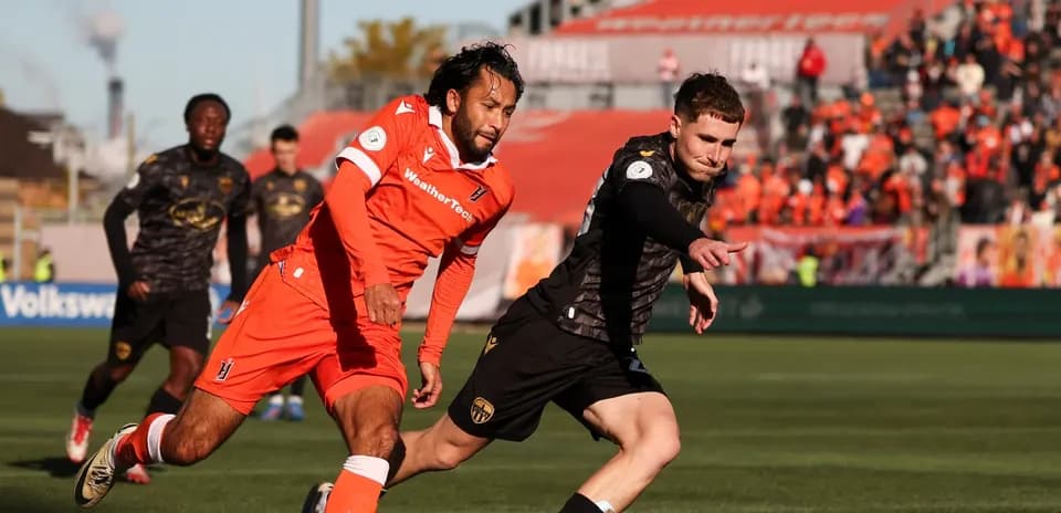 Player competing for the ball during match