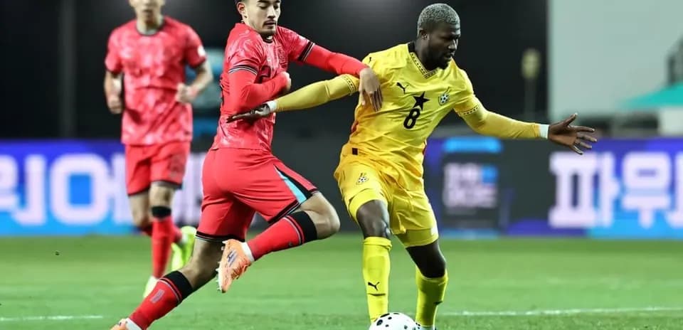 Players competing for the ball during a match