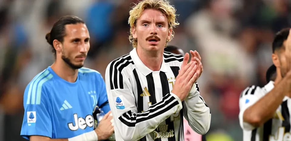 Juventus players applauding fans after the match
