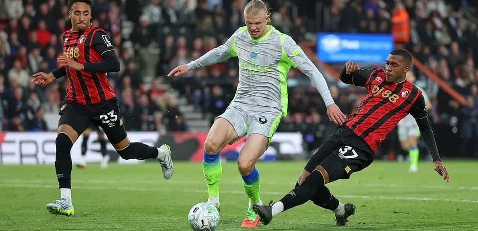 Erling Haaland in action against Bournemouth players