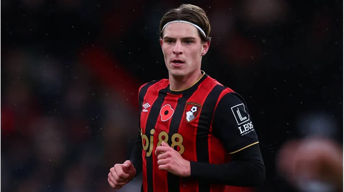 AFC Bournemouth player in red and black kit