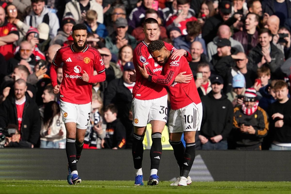 Manchester United players celebrating a goal