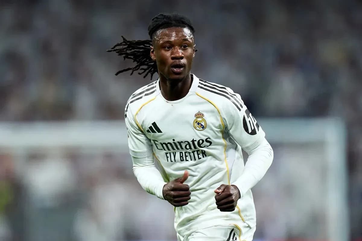 Player running during a match in Real Madrid kit