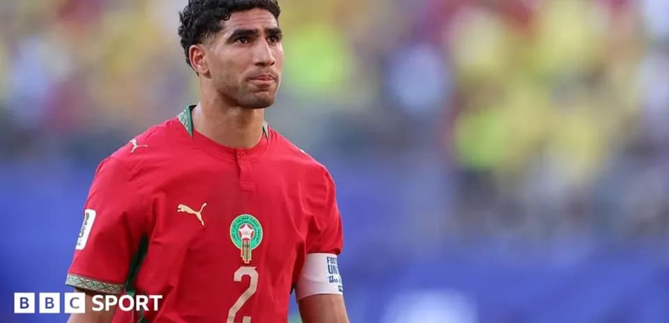 Moroccan player in red jersey on the field