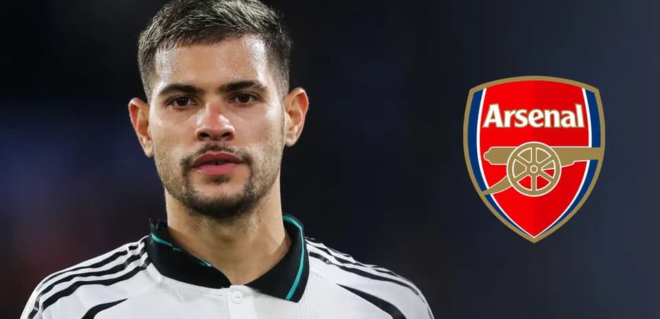 Player in jersey with Arsenal logo in background