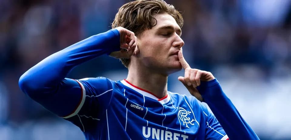Player celebrating with finger on lips gesture