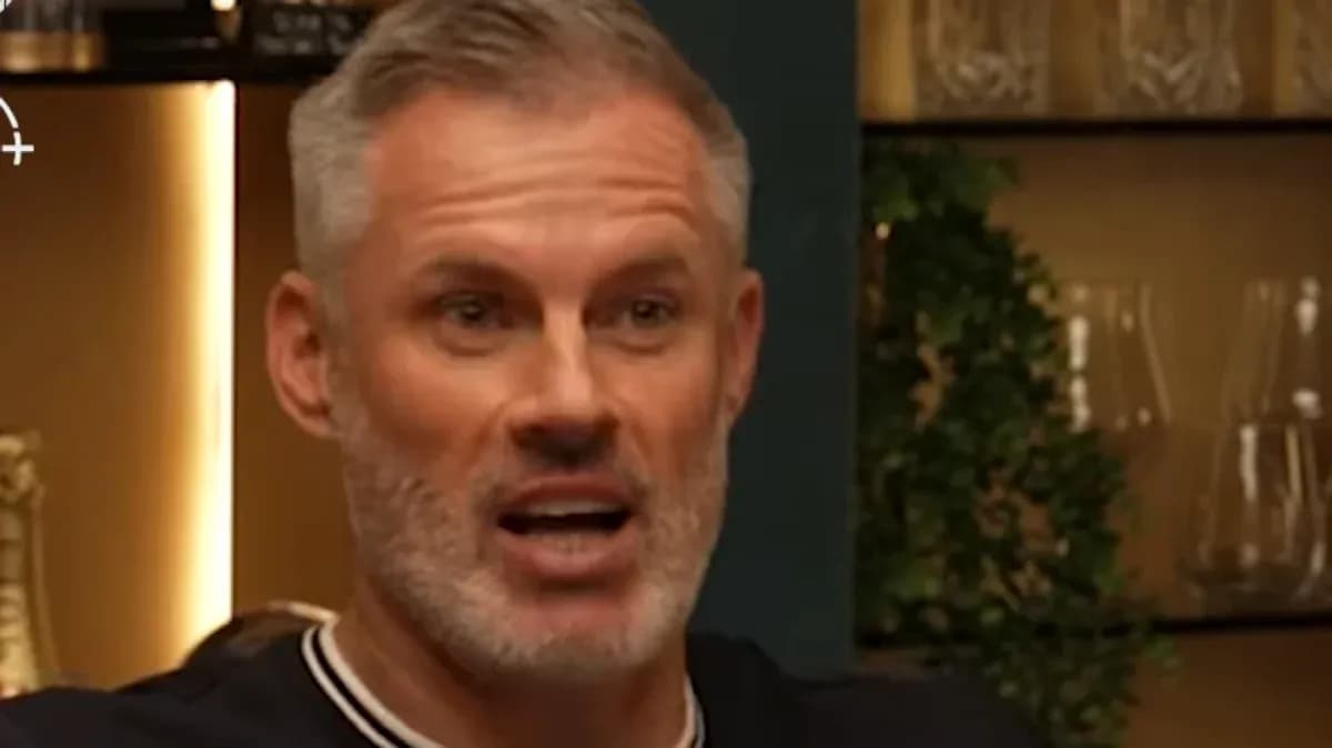 Man speaking during a discussion in a casual setting