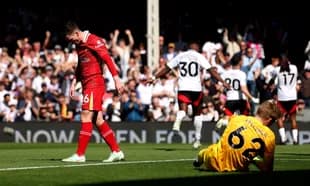 Liverpool player reacts after conceding a goal