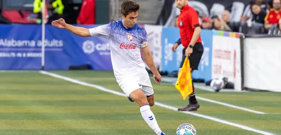 Player preparing to take a corner kick