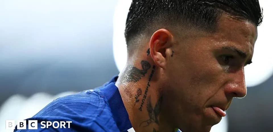 Player with tattoos looking focused during match