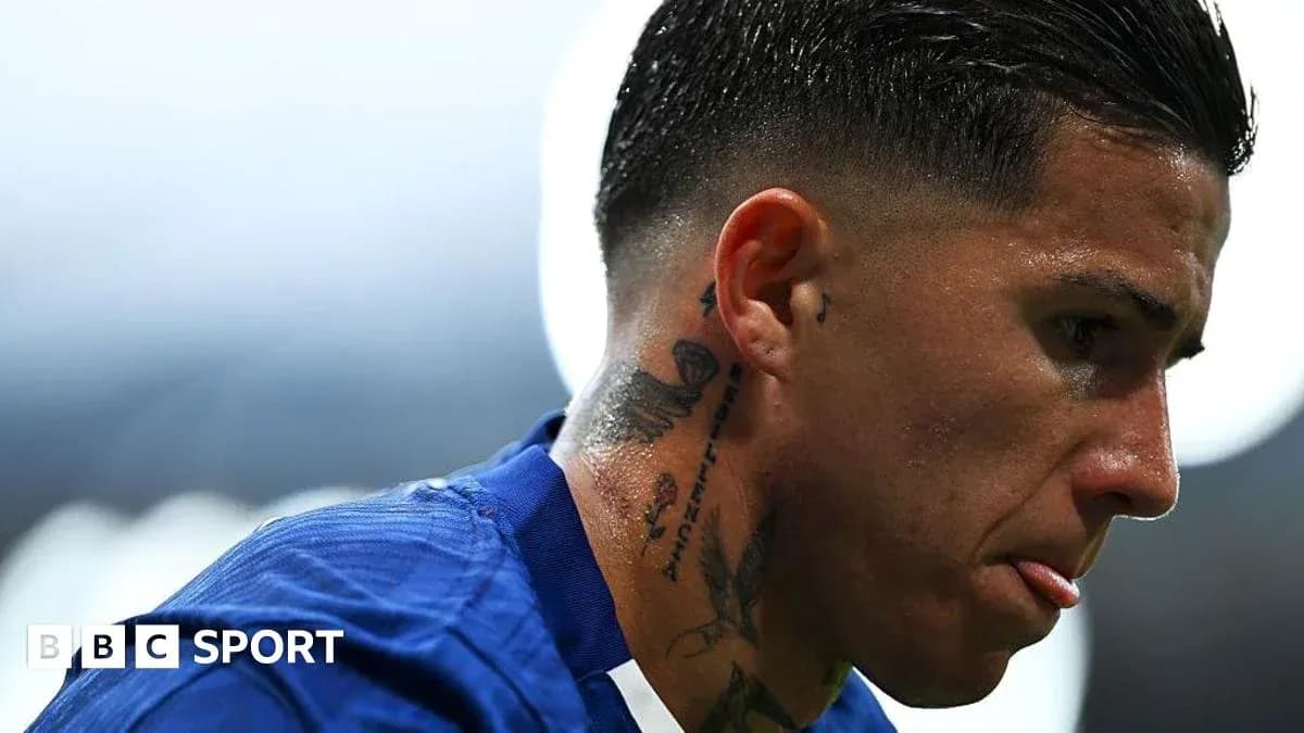 Player with tattoos looking focused during match