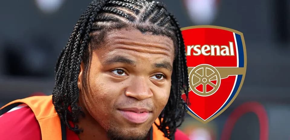 Player with braided hair and Arsenal logo background