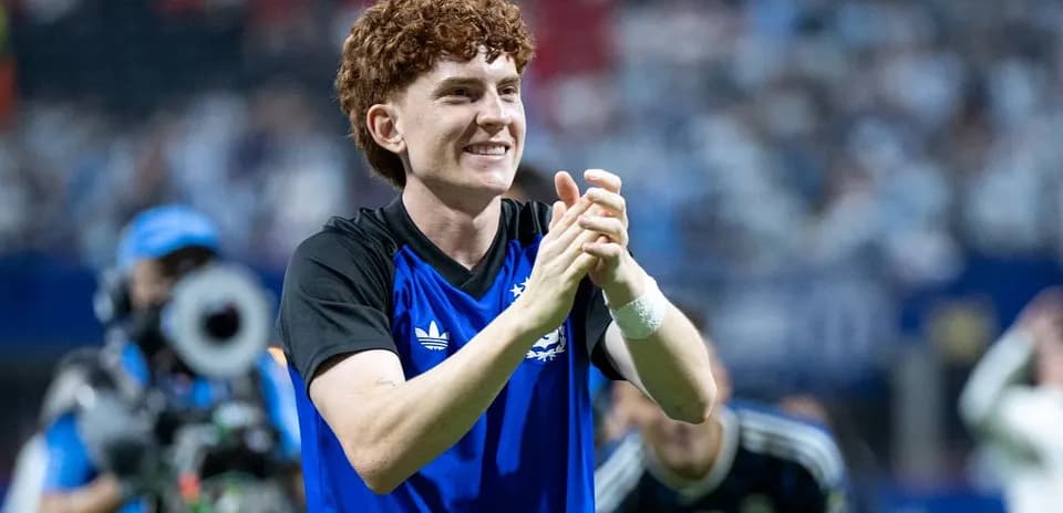 Player applauding fans after the match