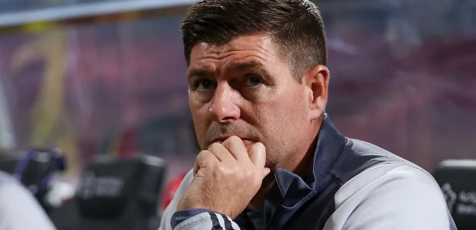 Coach observing the match from the sidelines